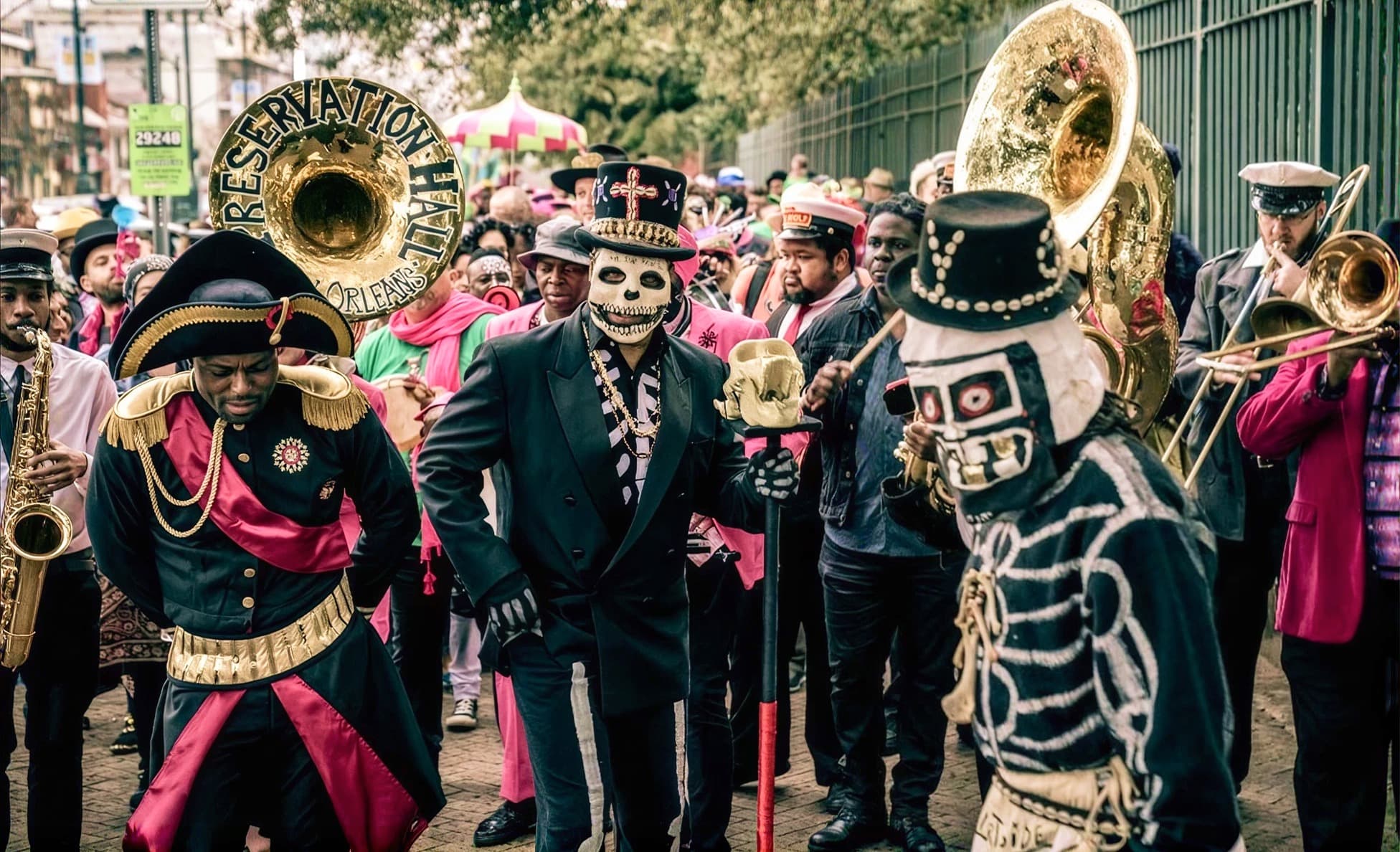 New Orleans brass band second line in skeleton and Baron Samedi costumes