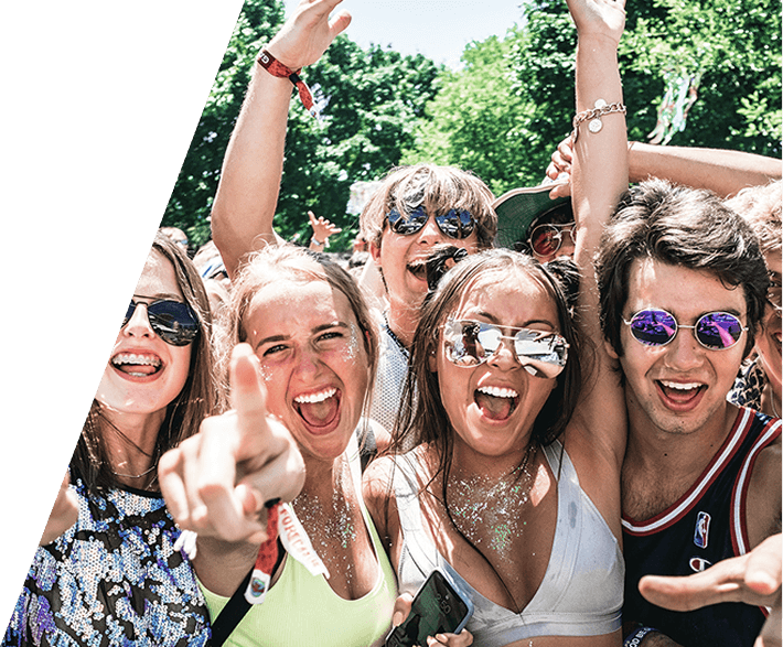 Festival attendees celebrating together — AOI consulting clients