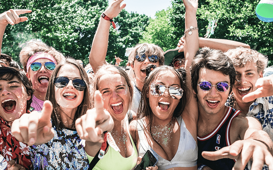 Festival attendees celebrating together — AOI consulting clients